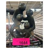 Abstract Family Sculpture in Dark Stone