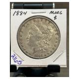 1884 Morgan Silver Dollar in Holder