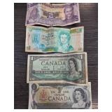 Four Canadian $1 Banknotes
