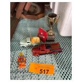 Group Lot with Diecast Trucks, Trophy, and Figure