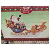 Santa in Sleigh With Reindeer Figurine