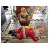 Two Santa Claus Figurines