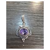 Amethyst Pendant With Decorative Silverwork