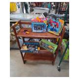 Wooden Three-Tier Shelf with Miscellaneous Items