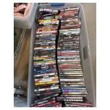 DVD Movies in Plastic Bin