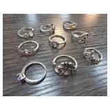 Nine Silver-Tone Rings with Various Designs