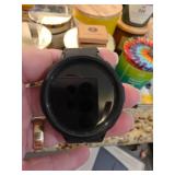 Black Samsung Smartwatch With W Charger