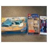 Shark Swim Mask, Monster Truck Kit, and Elf Figure
