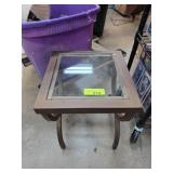 Glass-Top Metal Table With Curved Legs