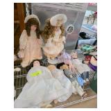 Porcelain Dolls with Various Outfits