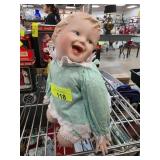 Bisque Porcelain Baby Doll in Green Dress