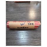 Roll of Wheat Pennies With Handwritten Label
