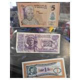 Three Foreign Banknotes in Plastic Sleeve