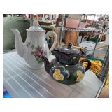 Two Ceramic Teapots With Floral Designs
