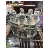 Cast Circular Sculpture of Figurines Holding Hands