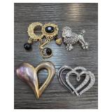Four Decorative Pins