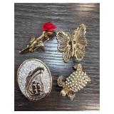 Four Vintage Gold-Tone Brooches