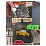 Coca-Cola Contour Bottle and Taxi Collectibles