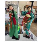 Traditional Figurines in Green Attire
