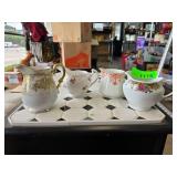 Four Decorative Ceramic Pitchers