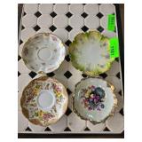 Four Decorative Porcelain Saucers