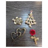 Four Decorative Brooches