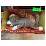 Battery-Operated Rollover Sock Monkey Toy