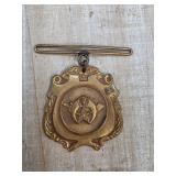 Vintage Gold-Toned Badge with Crescent and Star