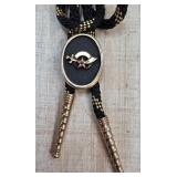 Black and Gold Bolo Tie with Ornate Detailing