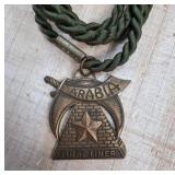 Brass Arabia First Liner Medal with Green Cord