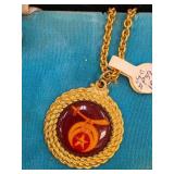 Gold-Tone Pendant With Red Accent