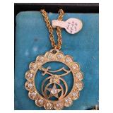 Gold-Tone Pendant With Rhinestones on Chain