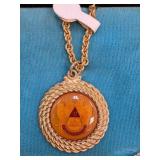 Gold-Toned Necklace with Enameled Emblem Pendant