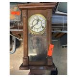 Wooden Wall Clock With Pendulum and Roman Numerals