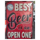 Red Metal Beer Sign With White Text