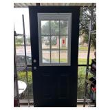 Black Door with Window and Panel Design
