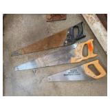 Three Hand Saws With Various Handles