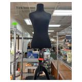 Black Mannequin Torso on Wooden Stand
