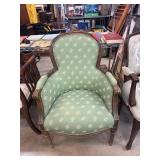 Green Upholstered Armchair With Decorative Wood Fr
