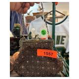 Beaded Handbag with Ornate Metal Frame