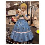 Hand-Painted Ceramic Figurine of Girl Holding Flow