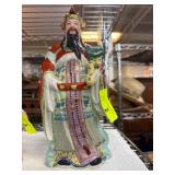 Porcelain Figurine of a Bearded Man in Traditional