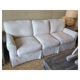 Three-Seater Beige Upholstered Sofa