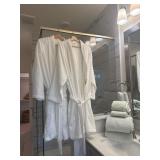 Two White Bathrobes and Towels