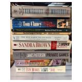 Nine Hardcover and Paperback Books