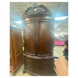 Ornate Wooden Armoire with Storage and Shelving