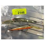 Fishing Lures with Metallic and Orange Finishes