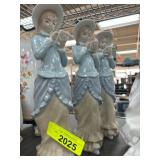 Three Porcelain Figurines with Hats