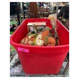 Red Bin of Fall-Themed Decorations