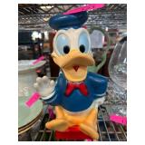 Plastic Donald Duck Coin Bank with Red Base